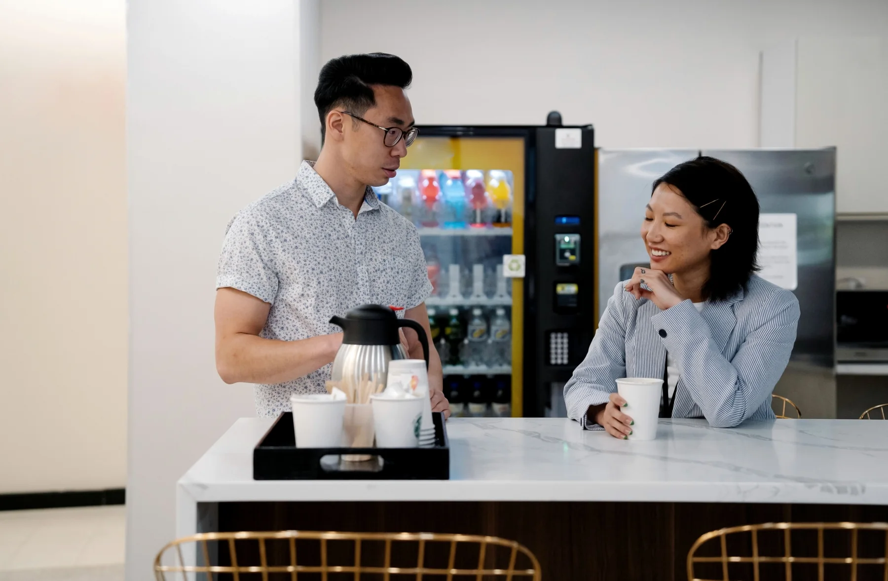 People using a workplace vending machine